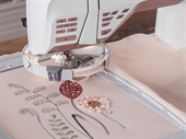 Ribbon embroidery attachment